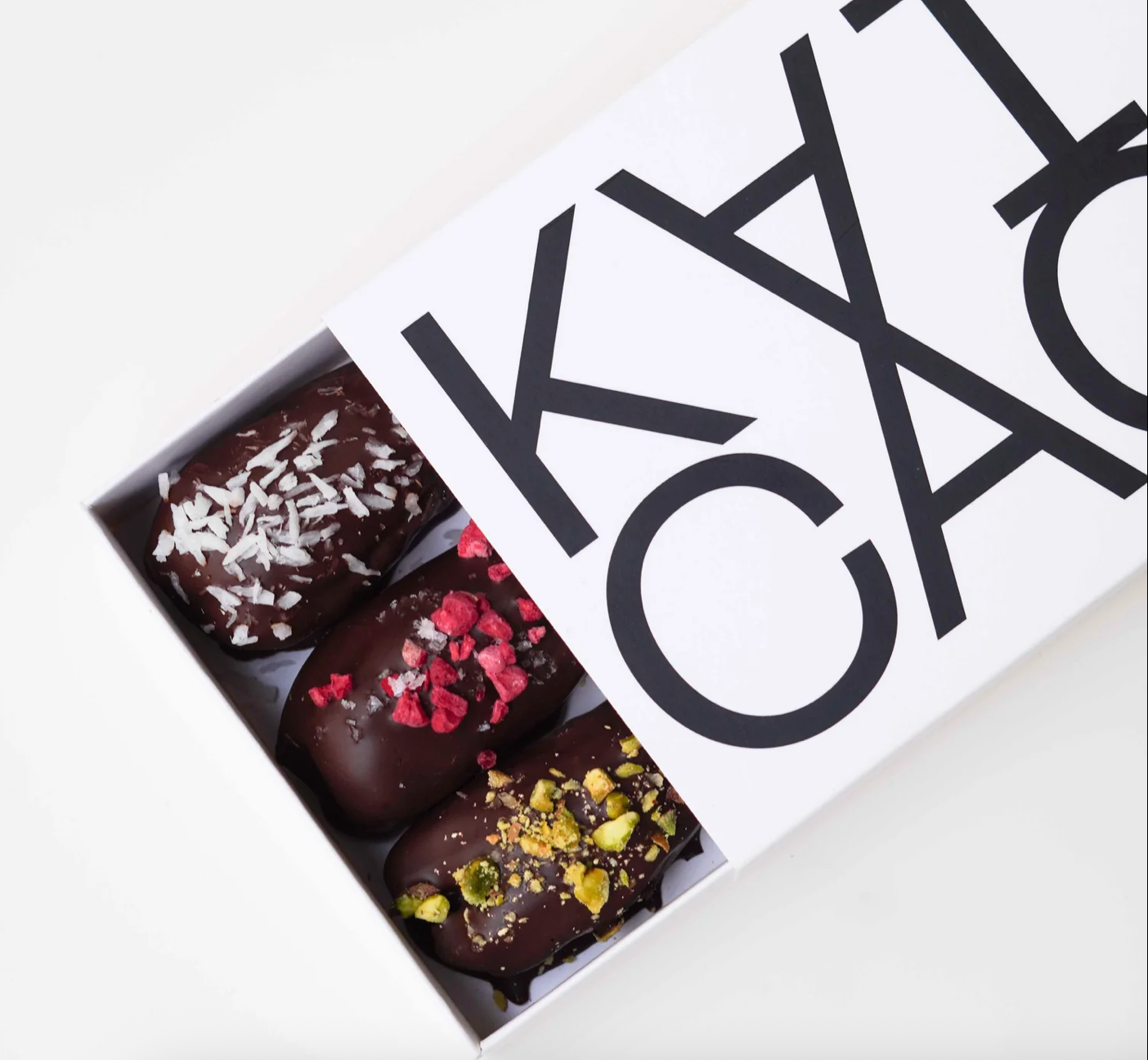 Kai Cao - Pack of 6 Medjool Dates filled with Nuts covered with 100% Chocolate